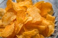 Roasted potato chips in bowl Royalty Free Stock Photo