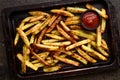 Roasted potato fries and tomato sauce