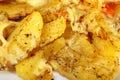 roasted potatos with cheese as background Royalty Free Stock Photo