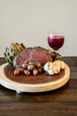 Roasted Prime Rib Steak with buttered artichoke, rosemary roasted small red potatoes Royalty Free Stock Photo