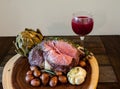 Roasted Prime Rib Steak with buttered artichoke, rosemary roasted small red potatoes
