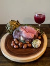 Roasted Prime Rib Steak with buttered artichoke, rosemary roasted small red potatoes Royalty Free Stock Photo