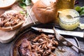 Roasted pulled pork bap served with cider Royalty Free Stock Photo