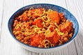 Pumpkin lentil chickpea dal in a bowl