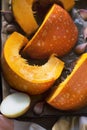 Roasted pumpkin with onion and garlic on baking tray. Preparing pumpkin soup Royalty Free Stock Photo