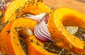 Roasted pumpkin with red onion, garlic and thyme Royalty Free Stock Photo