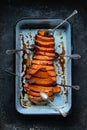 Roasted pumpkin in a roasting pan Royalty Free Stock Photo