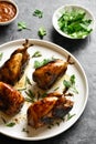 Roasted quails on white plate Royalty Free Stock Photo