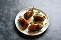 Roasted quails on white plate Royalty Free Stock Photo