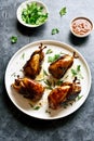 Roasted quails on white plate Royalty Free Stock Photo