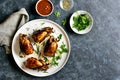 Roasted quails on white plate Royalty Free Stock Photo