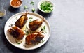 Roasted quails on white plate Royalty Free Stock Photo