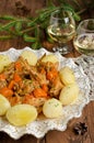 Roasted rabbit with herbs, vegetables and white wine sauce Royalty Free Stock Photo