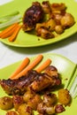 Roasted rabbit leg and vegetables Royalty Free Stock Photo
