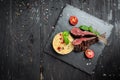 Roasted Rectangle Rack of Lamb Chops with couscous. on wooden background. banner, menu, recipe place for text, top view