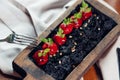 Roasted red beef ribs, meat on bone, black rice on plate Royalty Free Stock Photo