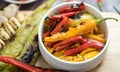 Roasted Red orange and green chili Peppers Royalty Free Stock Photo