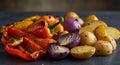 Roasted Red Yellow Orange Peppers Potatoes and Onions Royalty Free Stock Photo