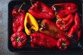 Roasted red and yellow peppers in baking tray Royalty Free Stock Photo