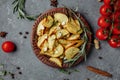 Roasted rosemary garlic potato wedges on a plate Royalty Free Stock Photo