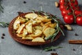 Roasted rosemary garlic potato wedges on a plate Royalty Free Stock Photo