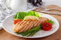 Roasted salmon steak with asparagos tomatoes  with fresh vegetable Royalty Free Stock Photo