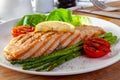 Roasted salmon steak with asparagos tomatoes  with fresh vegetable Royalty Free Stock Photo