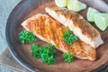 Roasted salmon steak with fresh parsley Royalty Free Stock Photo