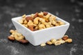 Roasted and salted nuts close up; selective focus Royalty Free Stock Photo