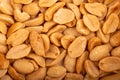 Roasted salted peanuts, surface texture. Close-up, selective focus Royalty Free Stock Photo