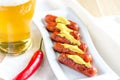 Roasted sausages with glass of beer Royalty Free Stock Photo