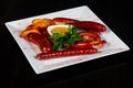 Roasted sausages plate Royalty Free Stock Photo