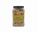 roasted sea salt cashew nuts - Anacardium occidentale - whole and halves, in plastic container with black screw on top. isolated