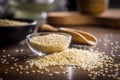 Roasted sesame seeds in bowl on wooden table Royalty Free Stock Photo