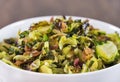 Roasted shaved brussels sprouts with crumbled bacon Royalty Free Stock Photo