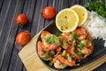 Roasted shrimps with lemon, garlic,herbs and white rise, seafood