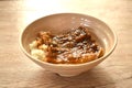 roasted slice pork bacon dressing Teriyaki Japanese sauce on rice in bowl Royalty Free Stock Photo