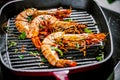 Grillen tiger prawns in iron man with lemon