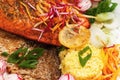 Roasted trout with vegetable and saffron rice, closeup. Royalty Free Stock Photo
