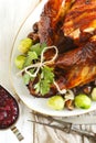 Roasted turkey with bacon and garnished with chestnuts andbrussels sprouts. Royalty Free Stock Photo