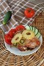 Roasted turkey meat with pineapple and kiwi