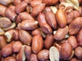 Roasted unpeeled peanuts macro. Close-up on peanuts background Royalty Free Stock Photo