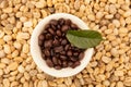 Roasted and unroasted coffee beans Royalty Free Stock Photo