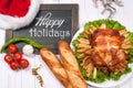 Roasted whole chicken and apple pie with Christmas decoration. Christmas dinner. Thanksgiving table served with turkey Royalty Free Stock Photo