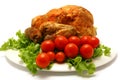 Roasted whole chicken with cherry tomato Royalty Free Stock Photo