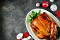 Roasted whole chicken. Delicious homemade food. Christmas background. Top view. Copy space. Royalty Free Stock Photo