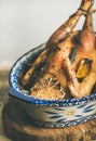 Roasted whole chicken with garlic for Christmas eve celebration table Royalty Free Stock Photo