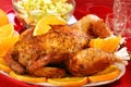 Roasted whole chicken with oranges