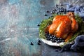 Roasted whole chicken with rosemary and blueberries