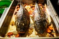 roasted whole stuffed fish with vegetables